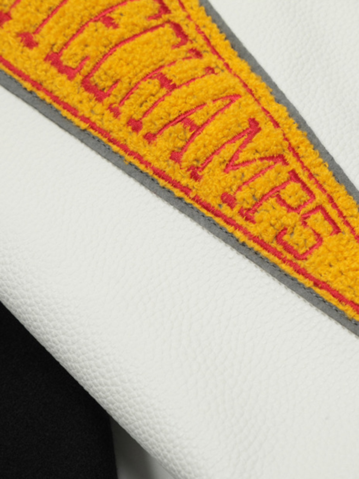 Boutique Mode Paris™ | Blouson aviateur matelassé en cuir patchwork brodé