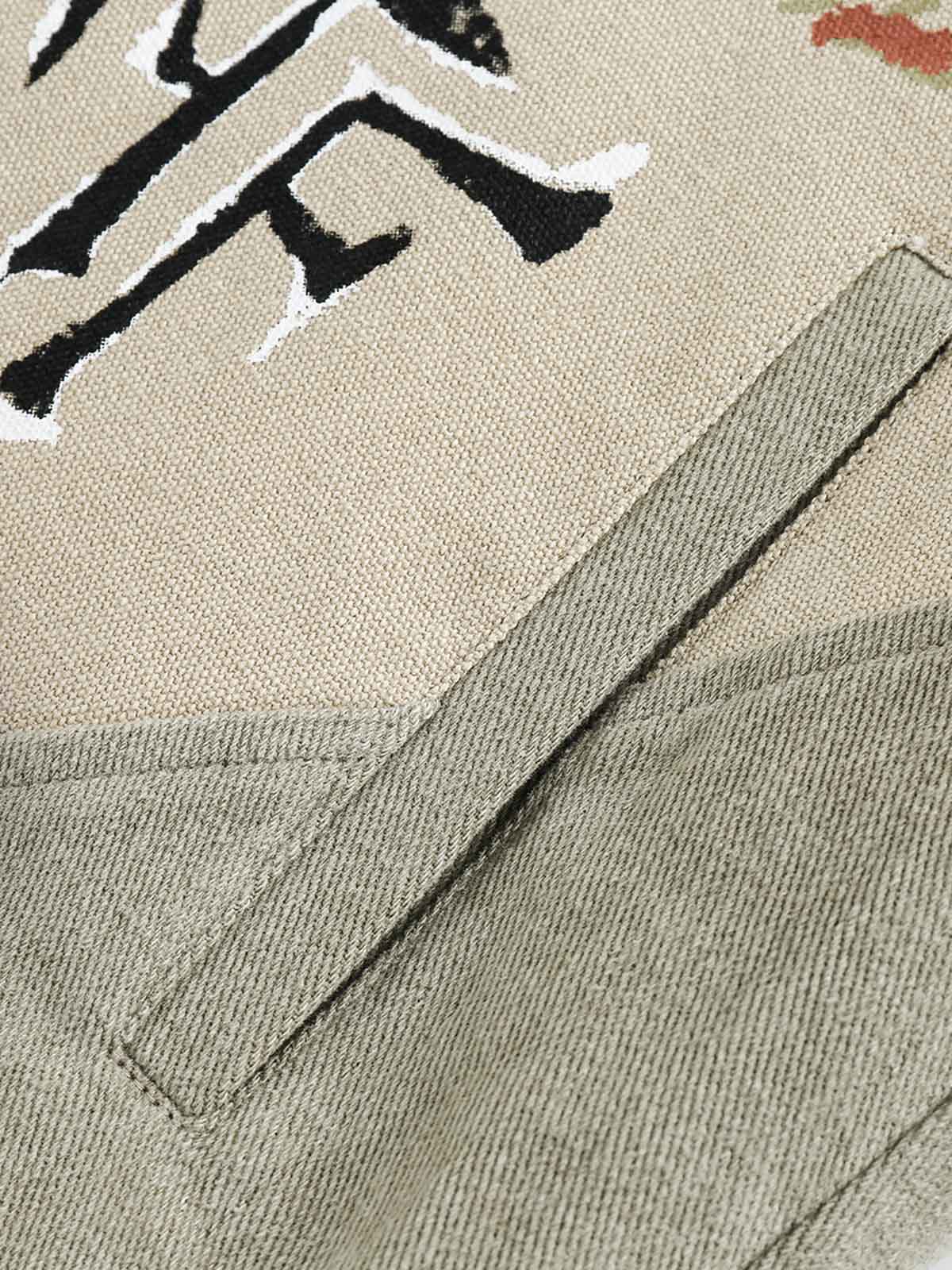 Boutique Mode Paris™ | Veste en denim à revers patchwork graffiti