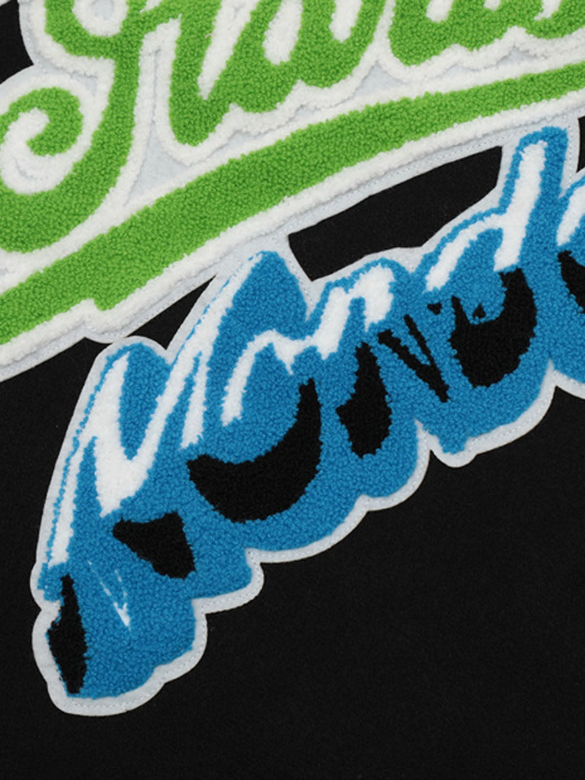 Boutique Mode Paris™ | Blouson aviateur matelassé en cuir patchwork brodé